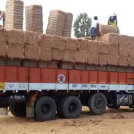 coir fiber bale loading onto truck